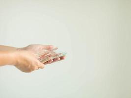 Russian money in RUB currency in various values on palm in selective focus on white background. photo