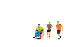 Miniature people Disabled happy friends having fun together photo