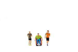 Miniature people Disabled happy friends having fun together photo