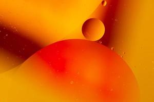 Abstract droplets oil bubbles on the water colorful background, macro photography oil bubbles surface photo