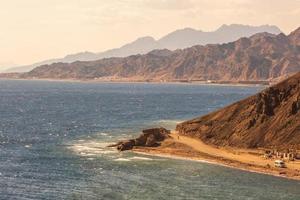 panorama in mountain range at sinai egypt similar to Martian landscapes with sea view photo