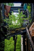 Broken wooden house in rural photo