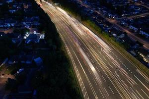 High Angle View of British Motorways with Traffic. The Aerial footage of British Roads and Motorways at between M1 Junction 7 and 9 at Sunset. The Footage captured on 09-07-2022 with drone's camera photo