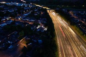 High Angle View of British Motorways with Traffic. The Aerial footage of British Roads and Motorways at between M1 Junction 7 and 9 at Sunset. The Footage captured on 09-07-2022 with drone's camera photo