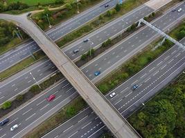 High Angle View of British Motorways with Traffic. The Aerial footage of British Roads and Motorways at between M1 Junction 7 and 9 at Sunset. The Footage captured on 09-07-2022 with drone's camera photo