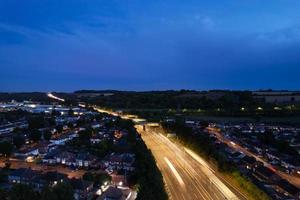 High Angle View of British Motorways with Traffic. The Aerial footage of British Roads and Motorways at between M1 Junction 7 and 9 at Sunset. The Footage captured on 09-07-2022 with drone's camera photo