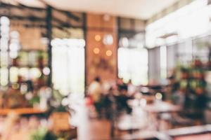 Restaurant cafe or coffee shop interior with people abstract defocused blur background photo