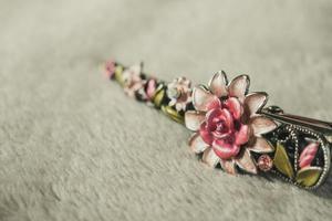 hair clip with jewelry and flower photo