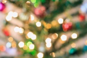 Christmas tree with bokeh light blur background photo