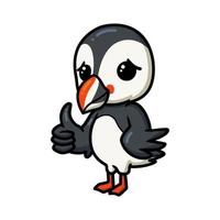 Cute little puffin bird cartoon giving thumb up vector