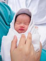 Happy Mother and Newborn Baby at the hospital photo