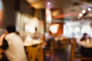 Restaurant cafe or coffee shop interior with people abstract blur background photo