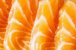 fresh salmon slice sashimi texture background photo