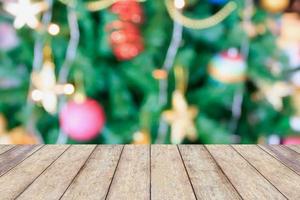 Christmas holiday background with empty rustic wood table photo