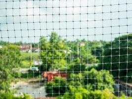 plastic net with garden background photo