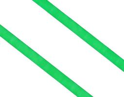 two diagonal parallel green silk ribbons isolated photo