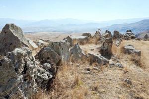 standing stones of Zorats Karer in Armenia photo