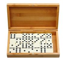 set of dominoes in wooden box photo