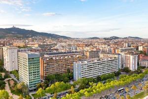 view on Barcelona avenue Diagonal and Tibidabo Mountain photo