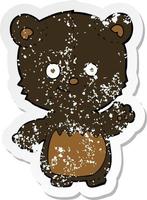 retro distressed sticker of a cartoon black bearcub waving vector