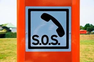 Sign SOS on France road photo