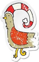 distressed sticker of a cartoon chicken in funny christmas hat vector