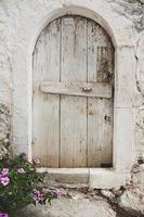 Narrow and colorful street in the village of Kritsa in the island of Crete photo