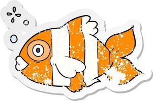 distressed sticker of a cartoon exotic fish vector