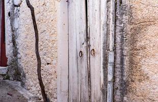 Narrow and colorful street in the village of Kritsa in the island of Crete photo