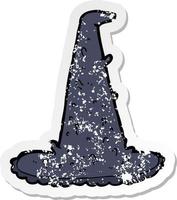 retro distressed sticker of a cartoon spooky witch hat vector