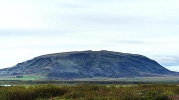 icelandic landscape with hill in september evening photo