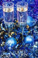 above view of glasses in blue Xmas decorations photo