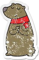 distressed sticker of a cartoon bear wearing scarf vector