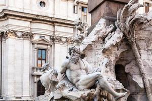 statues of Fontana dei Quattro Fiumi in Rome photo
