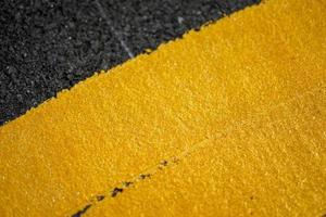 Close up fresh Thermoplastic on the asphalt road photo