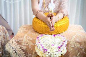 Traditional Thai wedding ceremony in local luxury vintage costume and wedding equipment. photo