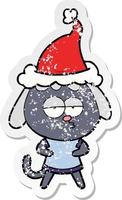 distressed sticker cartoon of a bored dog wearing santa hat vector