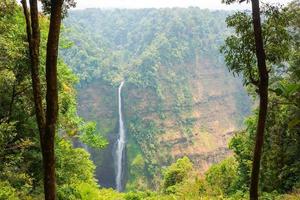 streaming line waterfall from high mountain in Laos photo