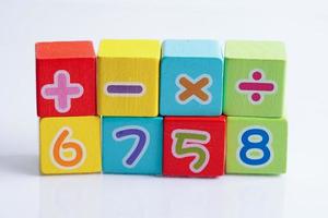 Number wood block cubes for learning Mathematic, education math concept. photo