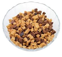 dried rye bread crust pieces in glass bowl photo