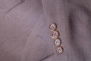 fragment of wool men's suit close up photo