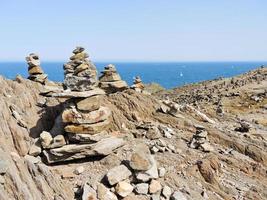 stone pyramids on Cap de Creus natural park, Spain photo