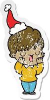 distressed sticker cartoon of a woman talking wearing santa hat vector