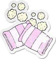retro distressed sticker of a cartoon pillow vector