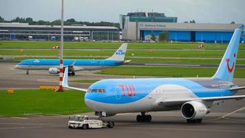 AMSTERDAM, THE NETHERLANDS JULY 29, 2017 - TUIFly Boeing 767 PH OYI towing before departure, Shiphol Airport, Amsterdam, Holland video