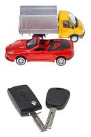 two vehicle keys and model truck and car photo