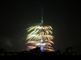 fireworks around Ostankino TV Tower in Moscow photo
