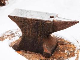 anvil in old abandoned village smithy photo