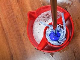 mop in bucket photo