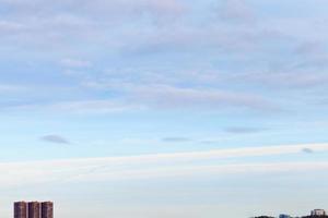 spring sky under urban houses photo